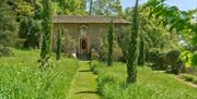 Exterior of the cloisters at Iford Manor Gardens, near Bath.