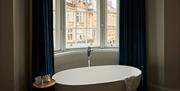Bath tub in the window of a suite in Harbour Hotel Bristol