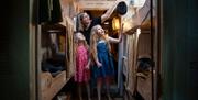 SS Great Britain - family exploring steerage